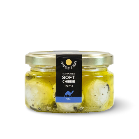Jar of camel milk marinated soft cheese with truffle flavor 